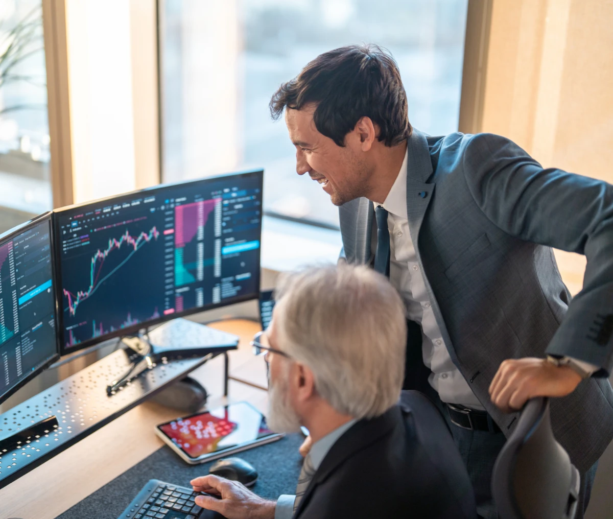 Professionals discussing investment trends in office
